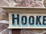 Hooked Rugs on old Window Pediment