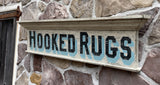 Hooked Rugs on old Window Pediment