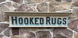 Hooked Rugs on old Window Pediment