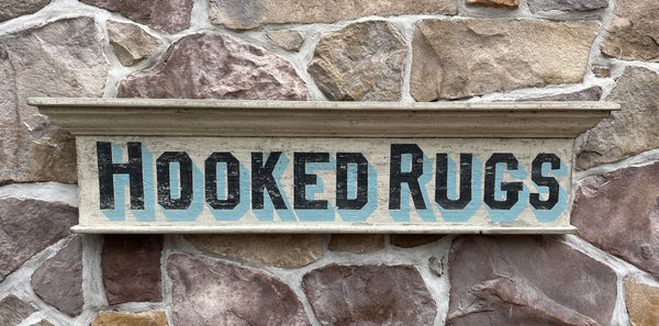 Hooked Rugs on old Window Pediment