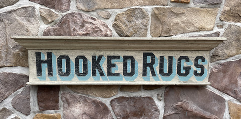 Hooked Rugs on old Window Pediment