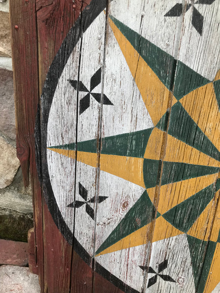 Barn Hex Sign on red barnboard