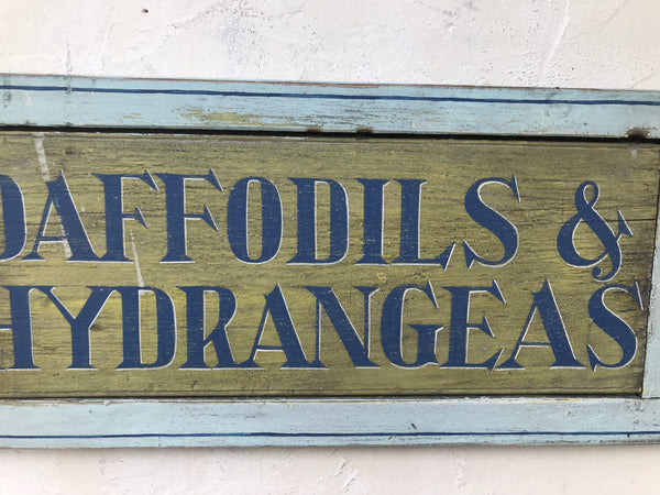 Daffodils and Hydrangeas on antique shutter