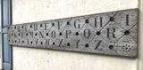 Alphabet on decorative antique board