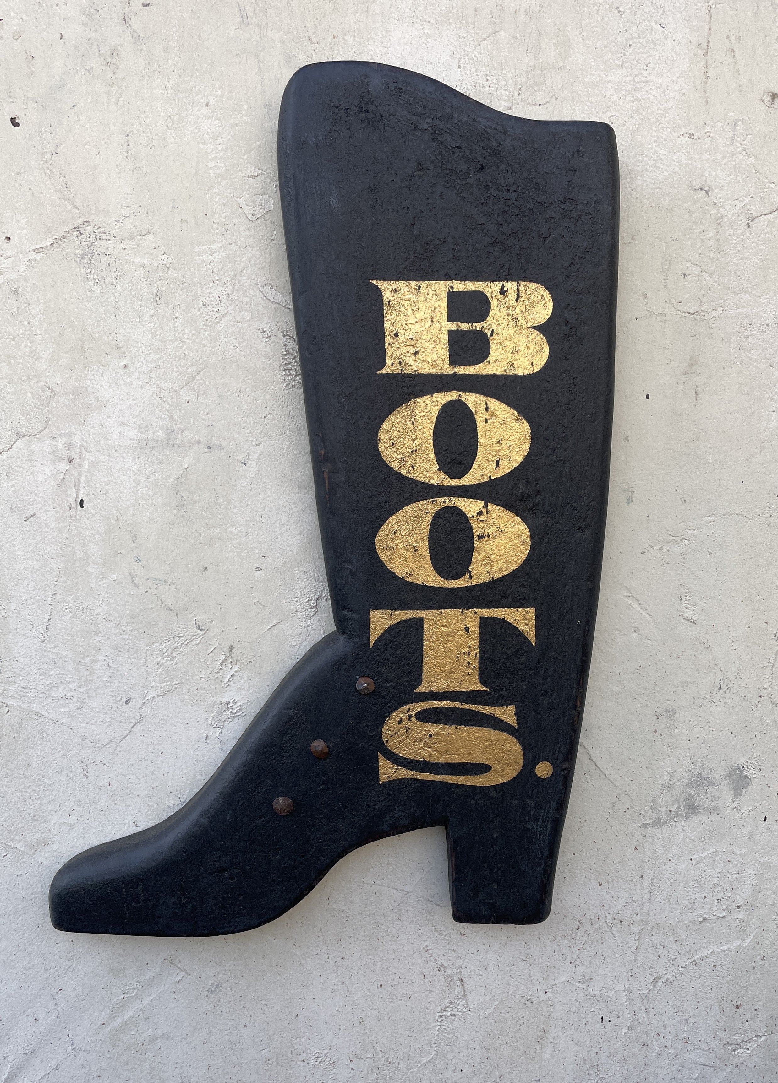 Bootmaker sign