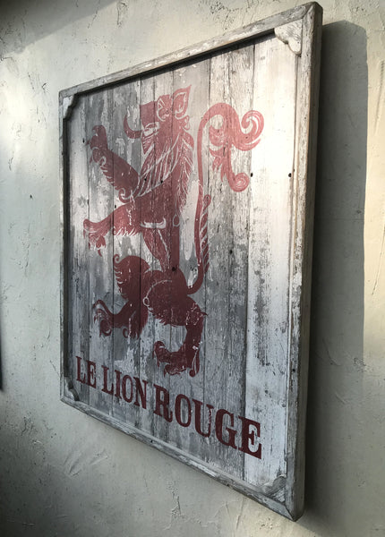 Le Lion Rouge French Tavern sign