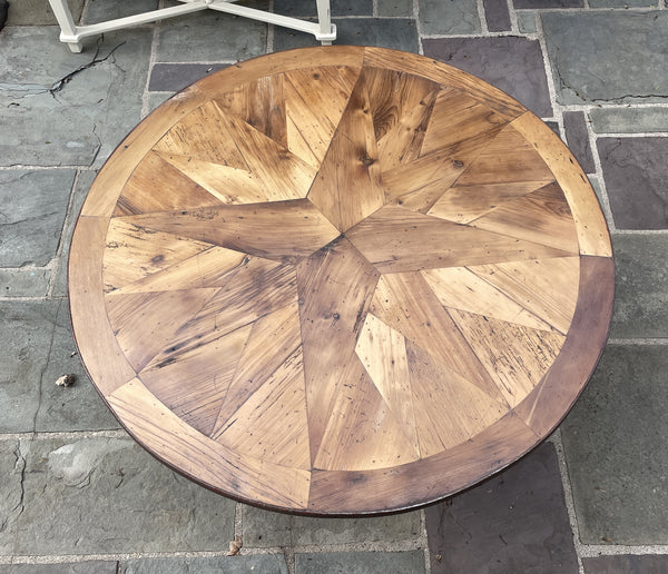 48" Round Table with Compass Rose design and Cast Iron Base