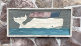Folk art whale with flag
