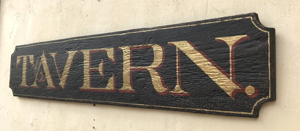"Tavern"  sign in black