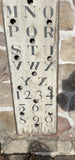 Vertical Alphabet on decorative antique board