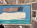 Folk art whale with flag