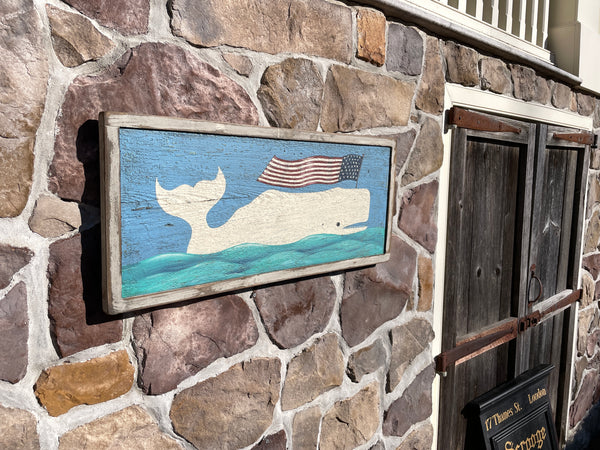 Folk art whale with flag