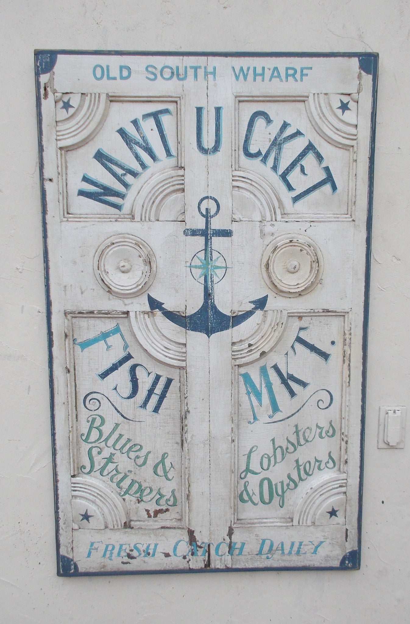 Nantucket Fish Market on antique door