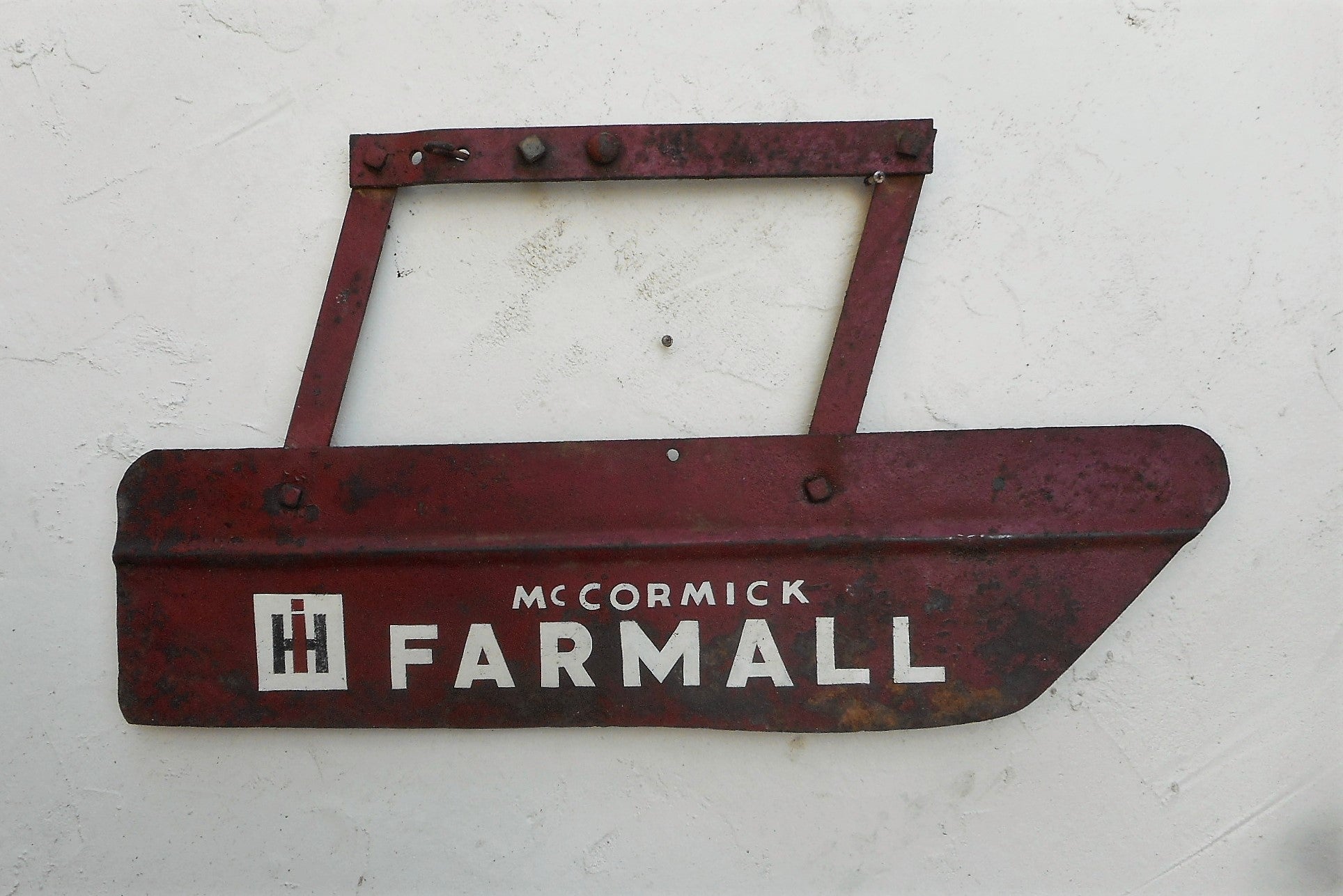 Antique Cultivator Fender Shield with painted Farmall Logo
